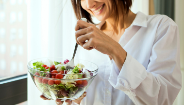 a girl eating healthy food